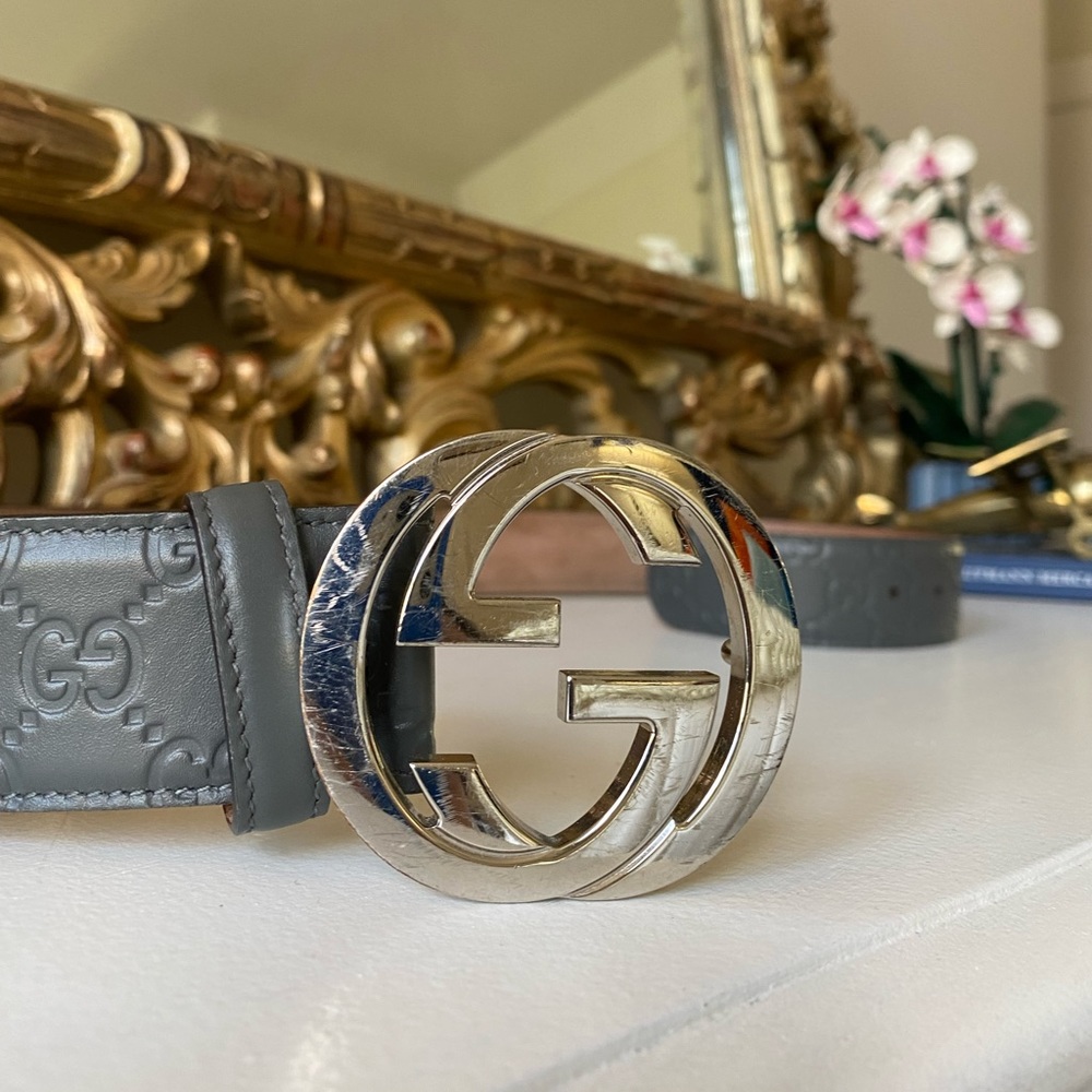 Grey and silver Gucci belt